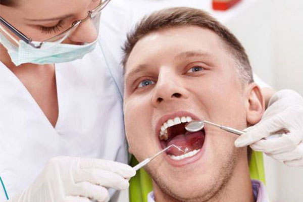 小孩牙根尖炎什么症状啊怎么治疗(小