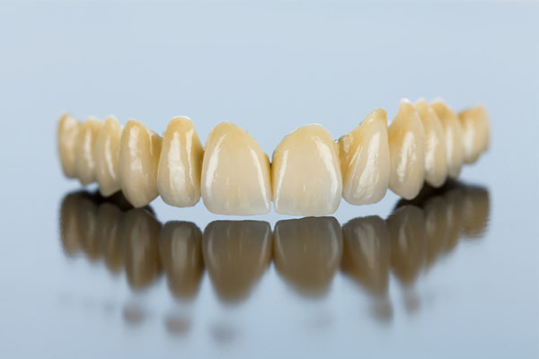 全口烤瓷牙费用一般在多少钱？中老年口腔批量定制省钱攻略